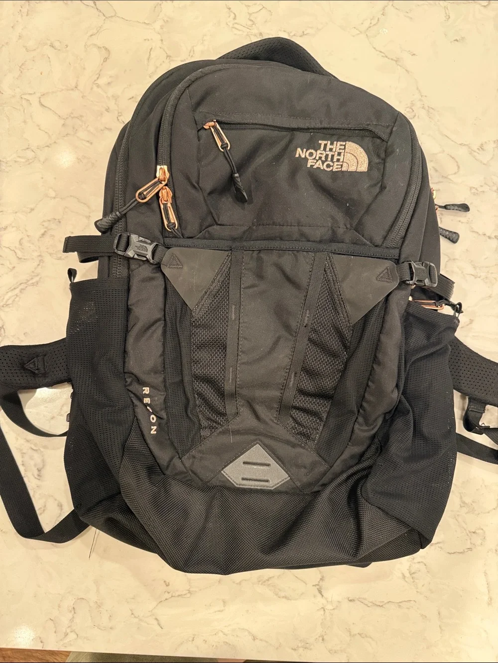 The North Face Black Backpack with Copper Zipper Accents